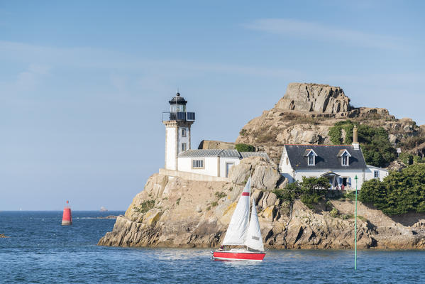 Sail boat in front of Île Louët. Carantec, Finistère, Brittany, France.