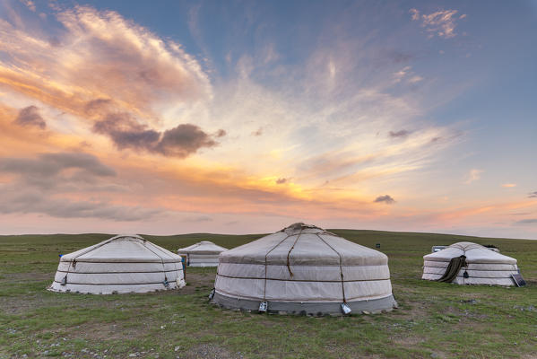 Mongolian nomadic traditional gers at sunset. Middle Gobi province, Mongolia.