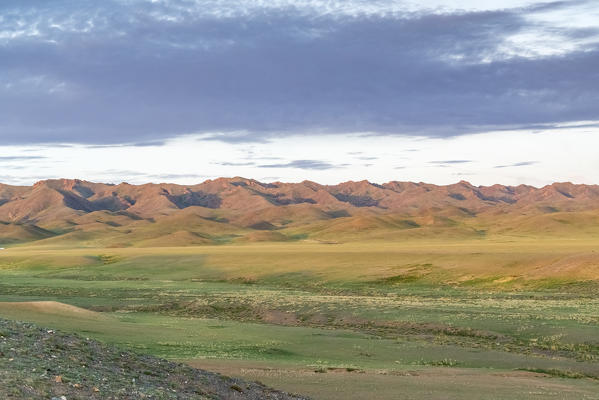 Desertic territory and mountains in the background. Bayandalai district, South Gobi province, Mongolia.