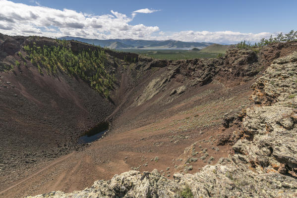 Khorgo volcano crater and White Lake in the background. Tariat district, North Hangay province, Mongolia.
