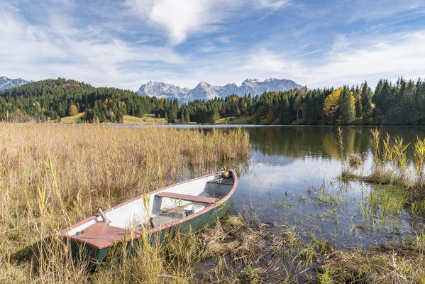 Abandoned boat on the shores of Gerold Lake. Krün, Upper Bavaria, Bavaria, Germany.