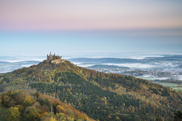 Hohenzollern castle in autumnal scenery at dawn. Hechingen, Baden-Württemberg, Germany.