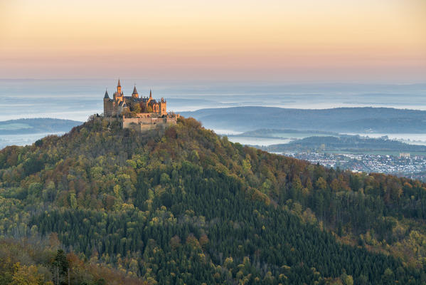 Hohenzollern castle in autumnal scenery at dawn. Hechingen, Baden-Württemberg, Germany.
