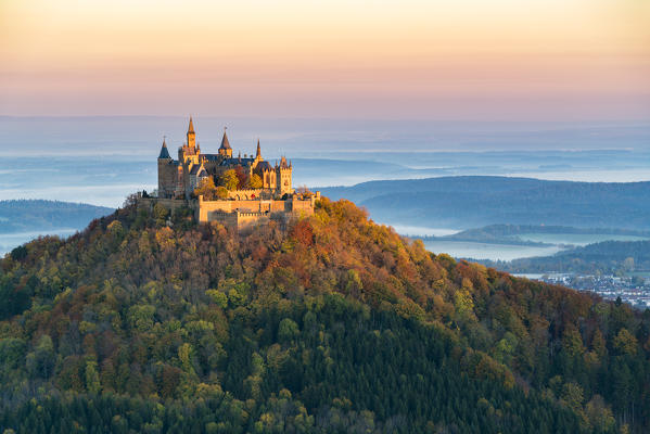 Hohenzollern castle in autumnal scenery at dawn. Hechingen, Baden-Württemberg, Germany.