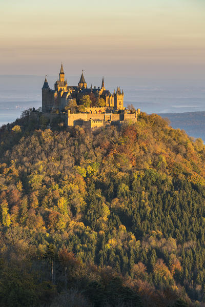 Hohenzollern castle in autumnal scenery at dawn. Hechingen, Baden-Württemberg, Germany.
