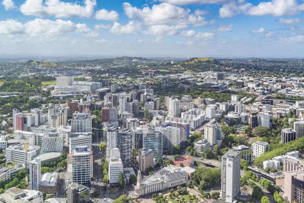 Cityscape looking southward from Sky Tower, with Mt Eden summit in the background. Auckland City, Auckland region, North Island, New Zealand.
