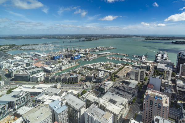 View of the city harbour and bridge  from Sky Tower. Auckland City, Auckland region, North Island, New Zealand.