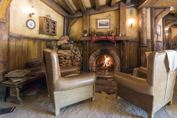 Fireplace at The Green Dragon Inn. Hobbiton Movie Set, Matamata, Waikato region, North Island, New Zealand.