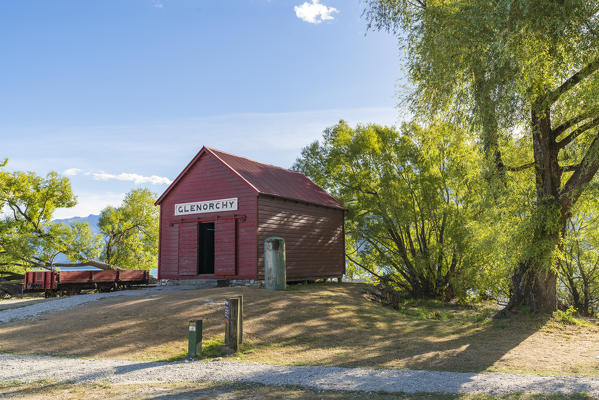 The red boat house in Glenorchy in summer. Queenstown Lakes district, Otago region, South Island, New Zealand.