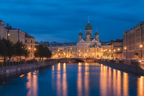 The Estonian Orthodox Holy Church of Saint Isidore on Griboyedov Canal at dusk. Saint Petersburg, Russia.