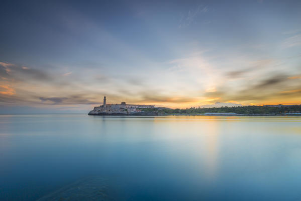 Sunrise over Castillo del Morro on the Malecon coastal area of Old Havana, Havana, Havana Province, Cuba