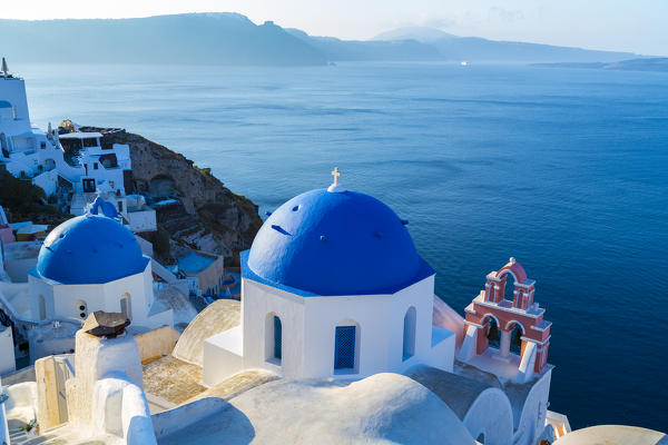 Typical buildings and churches in Oia, Santorini, Cyclades Islands, Greece
