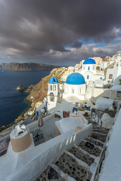 Typical buildings and churches in Oia, Santorini, Cyclades Islands, Greece