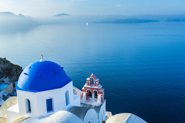 Typical buildings and churches in Oia, Santorini, Cyclades Islands, Greece