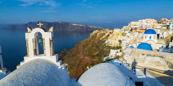 Typical buildings and churches in Oia, Santorini, Cyclades Islands, Greece