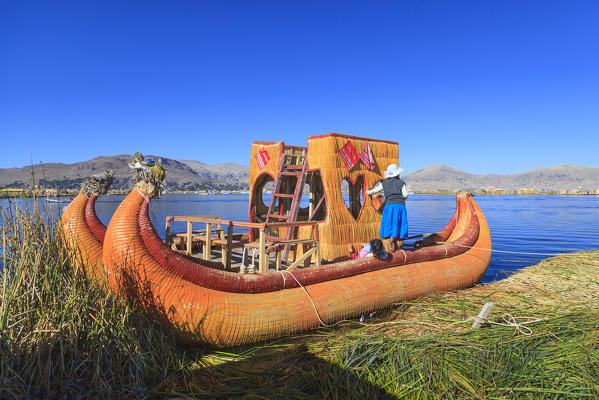 Uros floating islands on Lake Titicaca shore, off Puno, Peru, South America