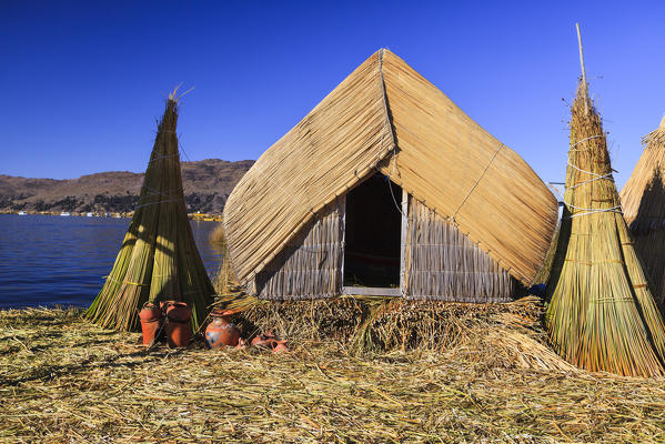 Uros floating islands on Lake Titicaca shore, off Puno, Peru, South America
