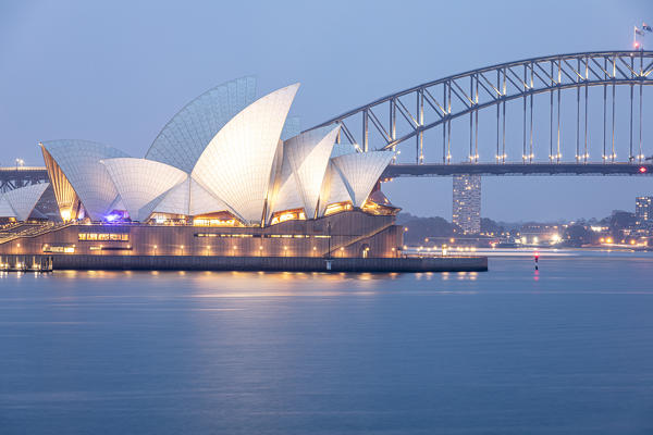 Sydney Harbour Bridge and Opera House at dusk, Sydney, New South Wales, Australia
