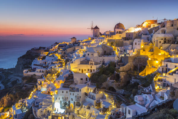 Sunset at the village of Oia in Santorini, Cyclades Islands, Greece