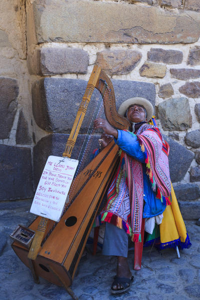 Blind musician in Ollantaytambo in the Sacred Valley, Cuzco province, Peru, South America