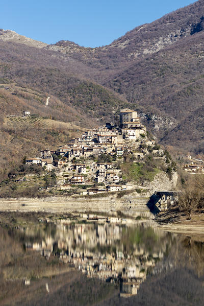 The village of Castel di Tora is reflected in the waters of Lake of Turano.
Europe, Italy, Lazio, Province of Rieti, Castel di Tora