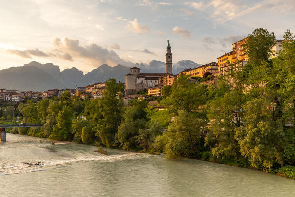 View of the historic center of Belluno with the Piave river flowing at sunset.
Europe, Italy, Veneto, Province of Belluno, Belluno