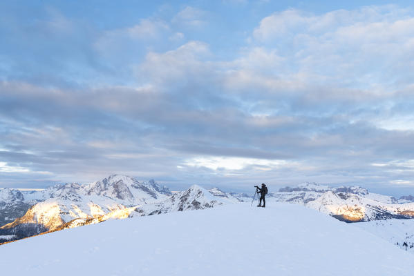 Photographer in Dolomites. Europe, Italy, Veneto, Belluno province, Giau pass
