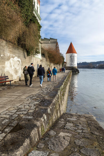 sidewalk on the banks of the river Inn in Passau. Europe, Germany, Passau, Bavaria district