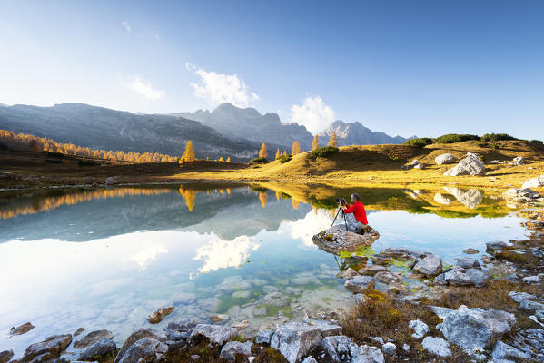 Photographer at work in natural park Adamello Brenta
Europe, Italy, Trentino, Trento province, Non valley, Flavon