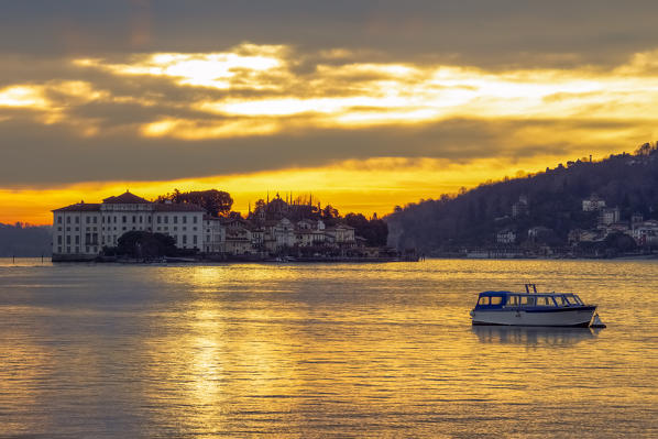 View of Isola Bella from the shore of Baveno in a winter sunrise, Piedmont, Italy.