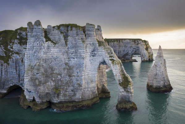 Aerial view of a sunset in front of the cliffs of Etretat, Octeville sur Mer, Le Havre, Seine Maritime, Normandy, France, Western Europe.