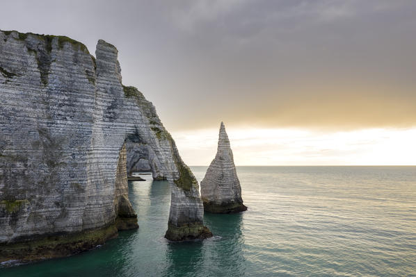 Aerial view of a sunset in front of the cliffs of Etretat, Octeville sur Mer, Le Havre, Seine Maritime, Normandy, France, Western Europe.
