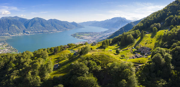 View of the stone church of Monti di Lego, overlooking Lago Maggiore, Ascona and Locarno. Mergoscia, Valle Verzasca, Canton Ticino, Switzerland.