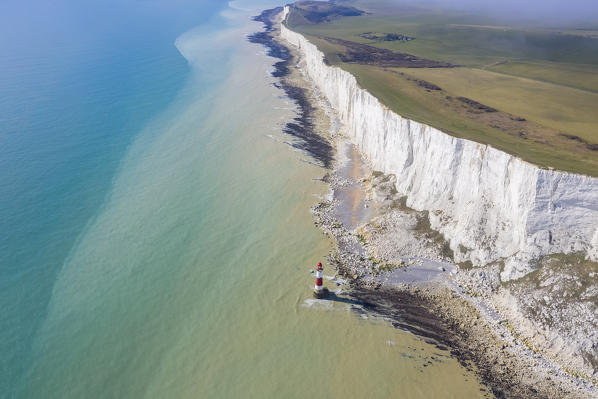 Aerial view of Beachy Head with it's Lighthouse, a chalk headland in East Sussex, England. It is situated close to Eastbourne, immediately east of the Seven Sisters. Southern England.
