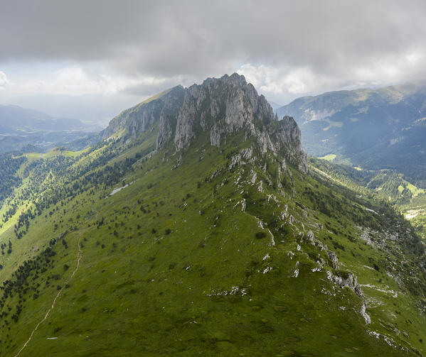 Aerial view of Cima di Bares and Valzurio valley at the foothills of Pizzo della Presolana. Castione della Presolana, Bergamo province, upper Val Seriana, Lombardy, Italy.