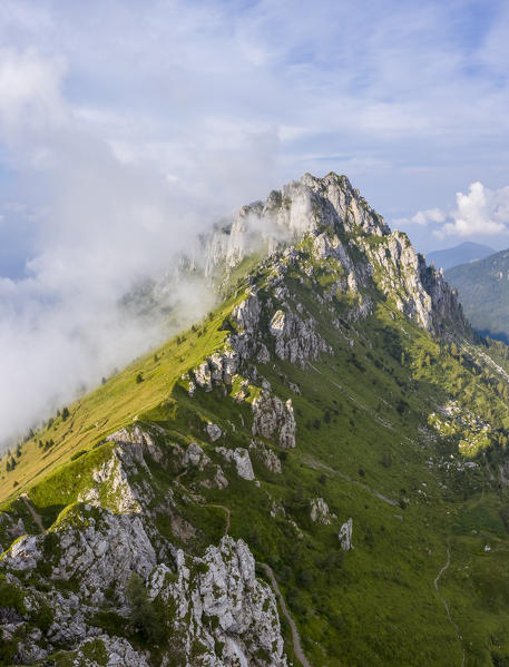 Aerial view of Cima di Bares, Passo Olone and Valzurio valley at the foothills of Pizzo della Presolana. Castione della Presolana, Bergamo province, upper Val Seriana, Lombardy, Italy.