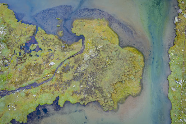 View from above of the estuary of a torrent flowing in the Lago Leit. Rodi, Prato Leventina, Valle Leventina, Canton Ticino, Switzerland.