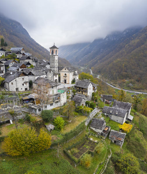 Autumnal view of the town of Corippo, the town with less inhabitants of all Switzerland. Corippo, Valle Verzasca, Canton Ticino, Switzerland.