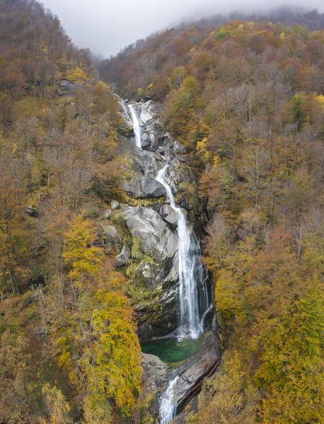 Aerial view of the waterfall of the river Valegg da Cansgell in autumn, near the town of Lavertezzo. Valle Verzasca, Canton Ticino, Switzerland.