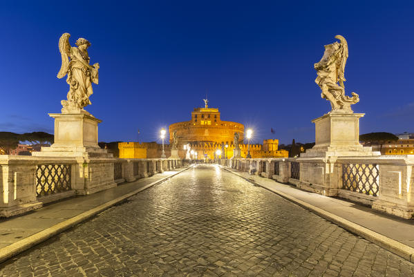 Blue hour in Rome in front of the Sant'Angelo bridge and Castel Sant'Angelo. Rome, Rome district, Lazio, Europe, Italy.