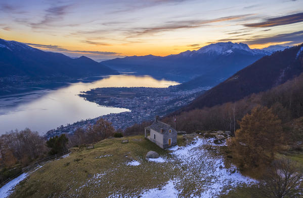 Aerial view of the stone church of Monti di Lego, overlooking Lago Maggiore, Ascona and Locarno. Mergoscia, Valle Verzasca, Canton Ticino, Switzerland.