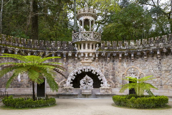 View of the Central pavilion at Portal of the Guardians in Quinta da Regaleira Palace's gardens. Sintra, Portugal, Europe.