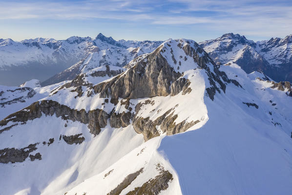 Aerial view of the top of the Monte Ferrante and Monte Ferrantino covered in snow in winter. Val di Scalve, Bergamo district, Lombardy, Italy, Southern Europe.