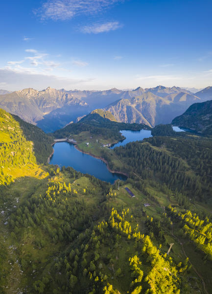 Aerial view of Lago Casere, Lago Marcio and Lago del Becco at sunrise. Branzi, Val Brembana, Alpi Orobie, Bergamo, Bergamo Province, Lombardy, Italy, Europe.