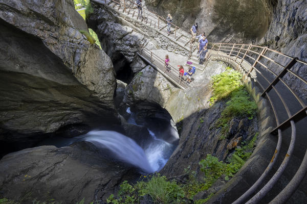 View of the trail inside the mountain following the course of the river Trümmelbach and it's waterfalls. Lauterbrunnen,Bernese Oberland, Canton of Bern, Switzerland, Europe.