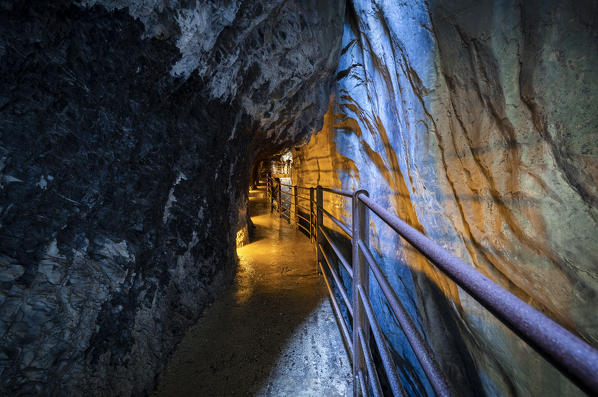 View of the trail inside the mountain following the course of the river Trümmelbach and it's waterfalls. Lauterbrunnen,Bernese Oberland, Canton of Bern, Switzerland, Europe.