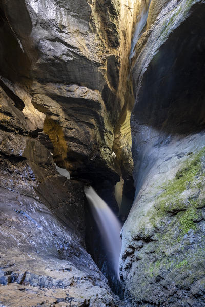 View of the trail inside the mountain following the course of the river Trümmelbach and it's waterfalls. Lauterbrunnen,Bernese Oberland, Canton of Bern, Switzerland, Europe.