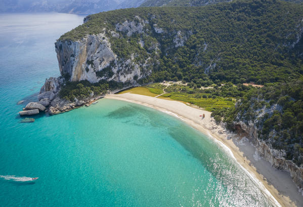 Aerial view of the amazing beach of Cala Luna and the mouth of the river Codula di Luna, Orosei gulf, Nuoro district, Ogliastra, Sardinia, Italy. 