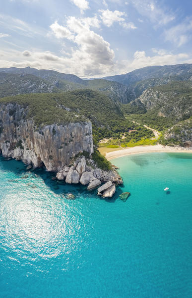 Aerial view of the amazing beach of Cala Luna and the mouth of the river Codula di Luna, Orosei gulf, Nuoro district, Ogliastra, Sardinia, Italy. 