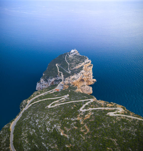 Aerial view of the rocky promontory of Capo Caccia and its lighthouse, Alghero,  Sassari district, Sardinia, Italy.